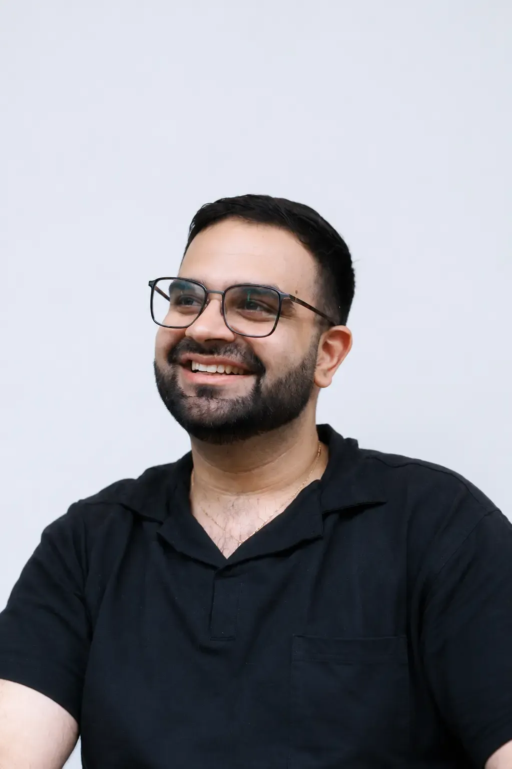 soham adwani  in a black tshirt 